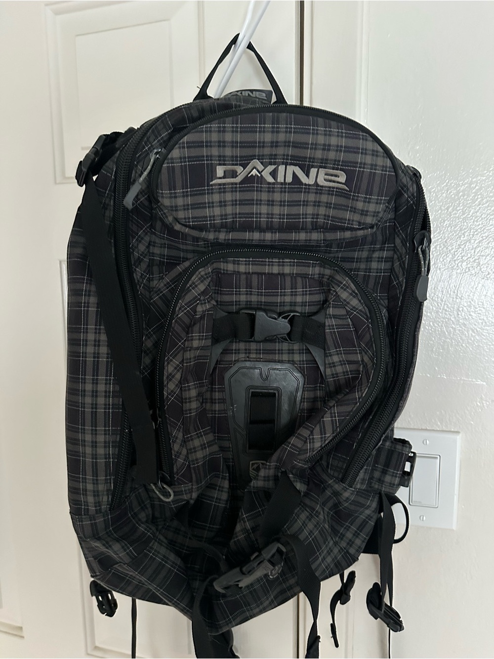 Dakine Black Plaid Men’s Backpack with Gray Accents